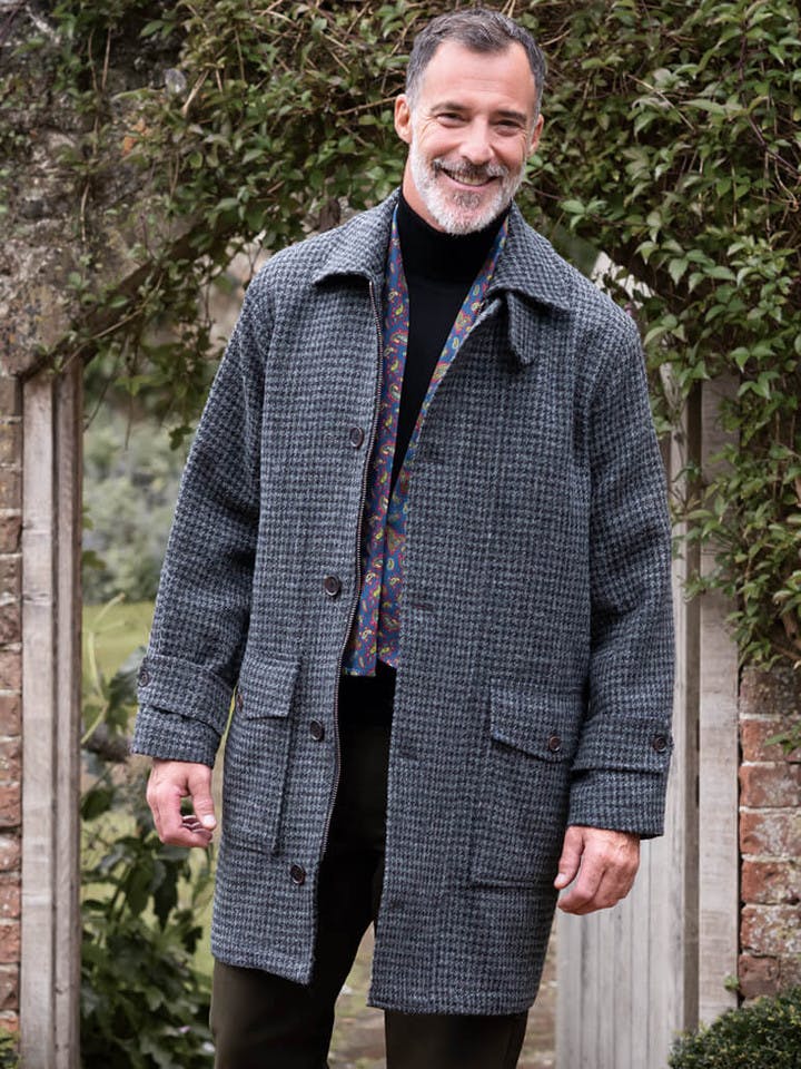 Model wears Gray Houndstooth Harris Tweed Overcoat